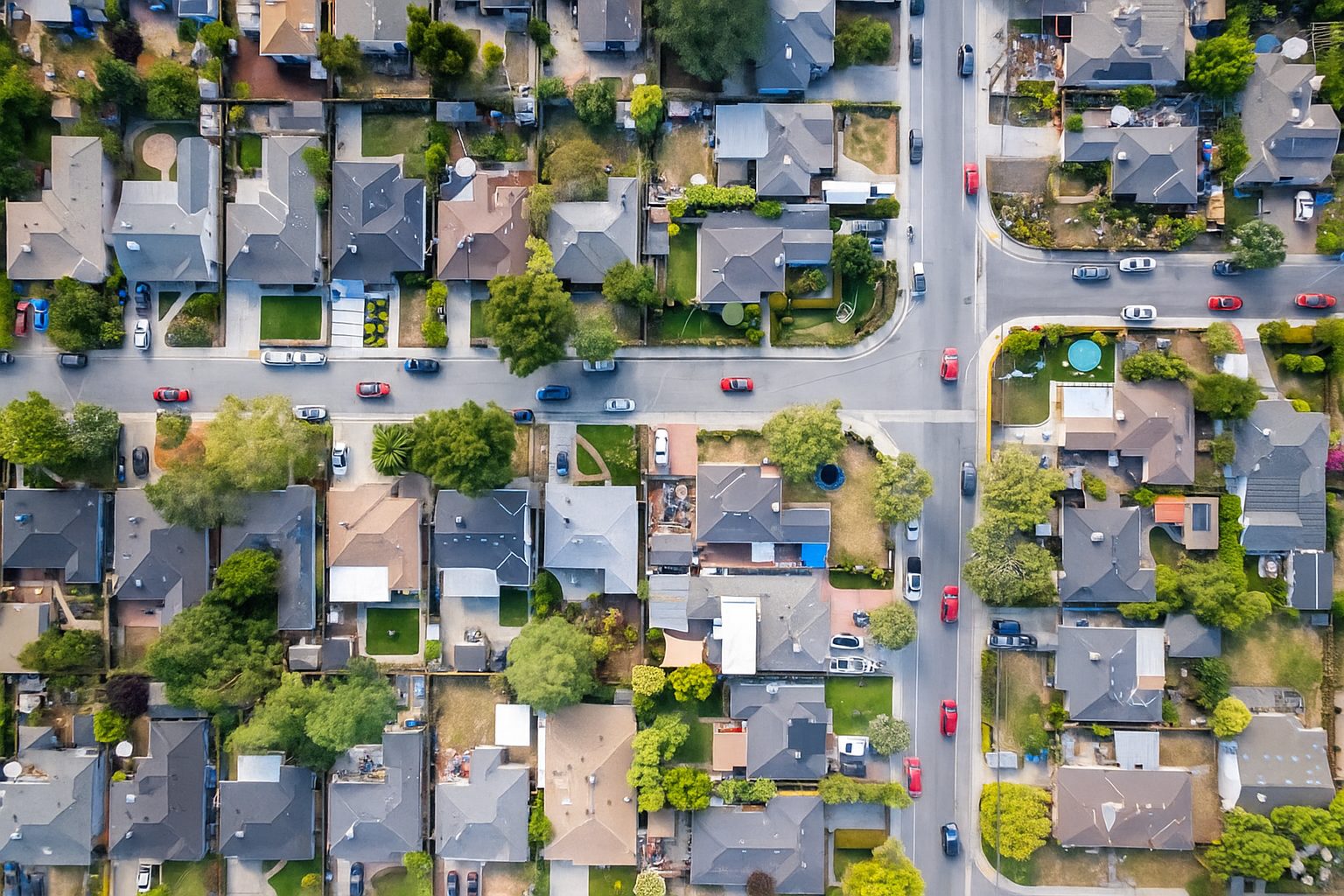 Aerial view of Redwood Oaks and Friendly Acres neighborhoods in Redwood City, showing tree-lined streets and tightly knit single-family homes.